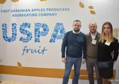 Volodymyr Gurzhiy, Dmytro Kroshka and Sophia Kushch from the USPA, a Ukranian company showcasing their apples.